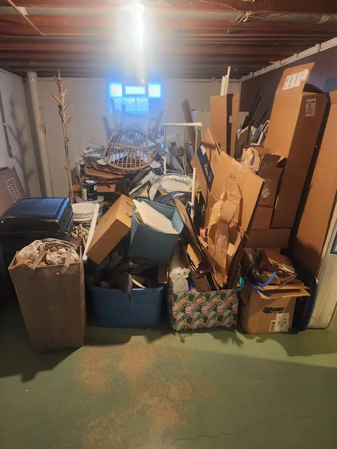 Roll-off dumpster container at job site for 20 Yard Dumpster Rental in Camden